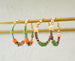 Colorful Beaded hoops, gold filled, statement earrings, multi colored earrings, green and purple, gold hoops,